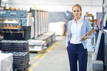 Aufkleber - Woman, clipboard and suit with confidence in warehouse or factory with production, paperwork and administration. Portrait, female person and stock or information capture in logistics company.
