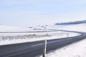 Wall Mural - country road in snow covered land