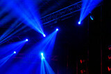Fototapeta Do przedpokoju - Stage Spotlight with rays. Concert lighting background