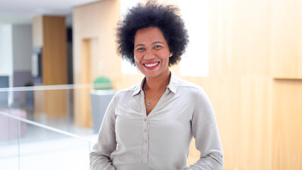 Wall Mural - Portrait of a happy businesswoman