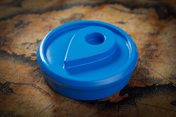 Fototapete - Blue Plastic Map Pointer Destination Pin on an Old Map. 3d Rendering