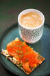 Avocado, salted salmon, egg and red caviar rye crisp toast
