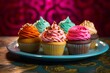 Tempting cupcakes on a metal tray against a colorful tile background
