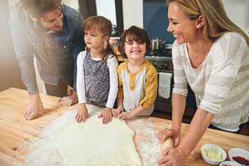 Canvas Print - Learning, happy and family baking food in kitchen together, bonding and smile in home. Pizza, mother and father with kids cooking, teaching and help parents with flour dough for preparation at table