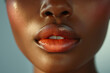 A detailed close-up showcases a woman's red lips, highlighting glossy lipstick and natural skin texture.