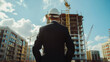  Business and architect concept. Businessman checking the construction site. Officials visiting the construction site.