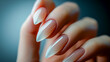 Elegant almond-shaped nail design close-up