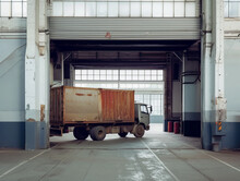 Old Truck Parked In Warehouse