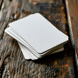 Blank white playing cards mock up on the wooden table. High-resolution