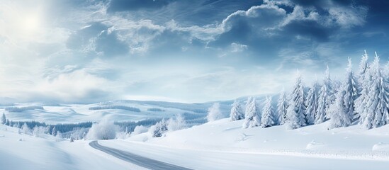Poster - A scenic winter landscape featuring a road in the mountains surrounded by snow-covered trees and ground