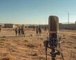A microphone planted near a makeshift desert soccer field captures the essence of the game