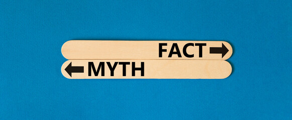 Wall Mural - Fact or myth symbol. Concept word Myth and Fact on beautiful wooden stick. Beautiful blue table blue background. Business and fact or myth concept. Copy space.