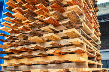 Wall Mural - Planks made of pine wood are stacked to dry