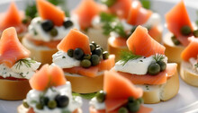 A Close-up Of Mini Sandwiches With Cream Cheese, Smoked Salmon On A White Plate 