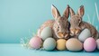 The magic of Easter embodied in two cuddly bunnies nestled among vivid eggs, creating a heartening image against a serene blue background.