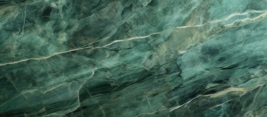 This detailed close-up showcases the intricate veining and unique texture of a matt green marble surface, suitable for use in ceramic tiles, Terrazzo flooring, and wall installations. The vibrant