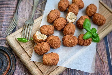 Wall Mural - Home made Feta and Olives Stuffed Greek Meatballs .Greek confort food. Mediterranean diet 