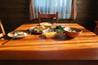 A variety of healthy toasts with vegetables and fried eggs, breakfast table at morning sunlight.