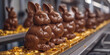 Süßer Schokoladen Osterhase in der Fabrik am Fließband bei der Produktion Nahaufnahme, ai generativ