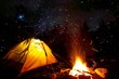 tent glowing by campfire with meteors in background