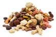 pile of assorted pet treats on a white background