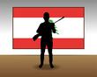 Man holding a gun in front of Lebanon flag, fight or war idea