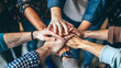 © Gita - A lot of people put their hand together, concept of unity, solidarity gesture, human connection