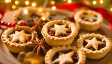 A Plate Of Freshly Baked Mince Pies Decorated With Bokeh Light