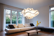 Sleek white ceiling lamp in spacious living room