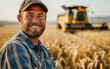 Portrait of happy white ethnicity man farmer stands in a wheat field and smiling. Adult man driver of agricultural combine harvester.