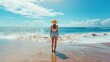 Woman strolling alone on a beach shoreline during sunny summer weather, atmospheric coastal scene with soft sand and calm waves, relaxing coastal getaway concept