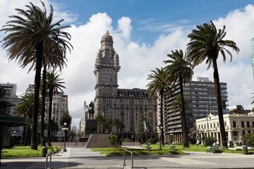 A beautiful day with clouds in the blue sky in the historic center of Montevideo, Uruguay, with Salvo Palace in the background