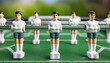 foosball or table football figurines with human faces