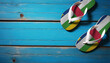 Pair of beach sandals with flag Central African Republic. Slippers for summer sea vacation. Concept travel and vacation in Central African Republic.
