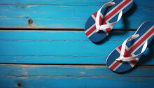 Pair Of Beach Sandals With Flag Iceland. Slippers For Summer Sea Vacation. Concept Travel And Vacation In Iceland.