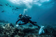 Scuba diver removes plastic trash underwater