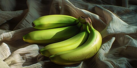 Wall Mural - Fresh green bananas resting on a burlap cloth with natural textural contrast