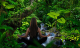 Fototapeta  - Woman doing yoga in front of rainforest