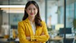 © Minerva Studio - Confident businesswoman in office environment