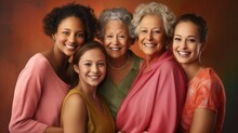 A Group Of Women Of Different Generations. Just Five Women Pose Together For A Photo. They Are All Smiling And Seem To Be Having A Good Time.