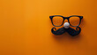 Overhead glasses nose and mustache for April 1 April Fool's Day, on orange background, 1st April Fool's Day! Mustache overhead glasses, April 1, joke, Generative AI 