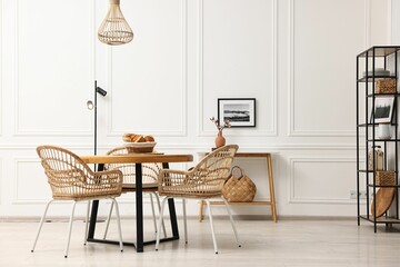 Aufkleber - Dining room interior with wooden table and wicker chairs