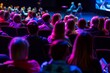 © Victoriia - Back view of attendees listening intently in a conference hall during a professional presentation with colorful lighting.