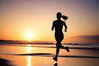 © Plutmaverick - Silhouette of woman running on the beach at sunset. Healthy lifestyle concept, poster, banner, copy space.