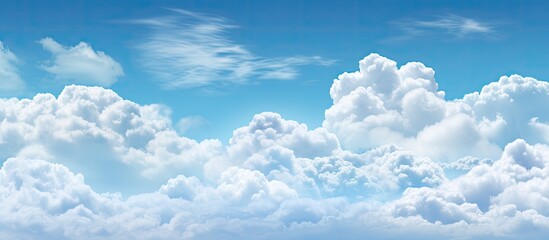 Wall Mural - A commercial jet aircraft soaring gracefully high up in the atmosphere amidst fluffy white clouds in the sky