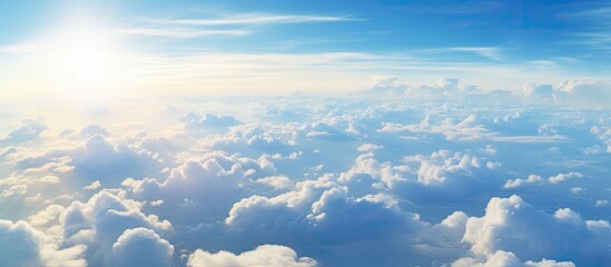 Wall Mural - the sun is breaking through the cumulus clouds in the atmospheric sky, creating a beautiful natural 
