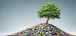 A free-standing green tree grows out of a pile of waste, plastic garbage and old electronic devices