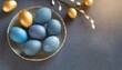 blue easter eggs painted by hand on a dark background easter stylish minimal composition top view flat lay copy space