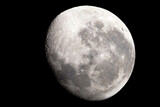 Fototapeta  - The moon is 17 days old and is in the waning gibbous phase of its lunar cycle. It is 95% illuminated