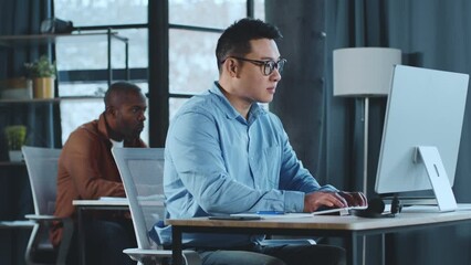 Poster - Man Using Computer at Desk